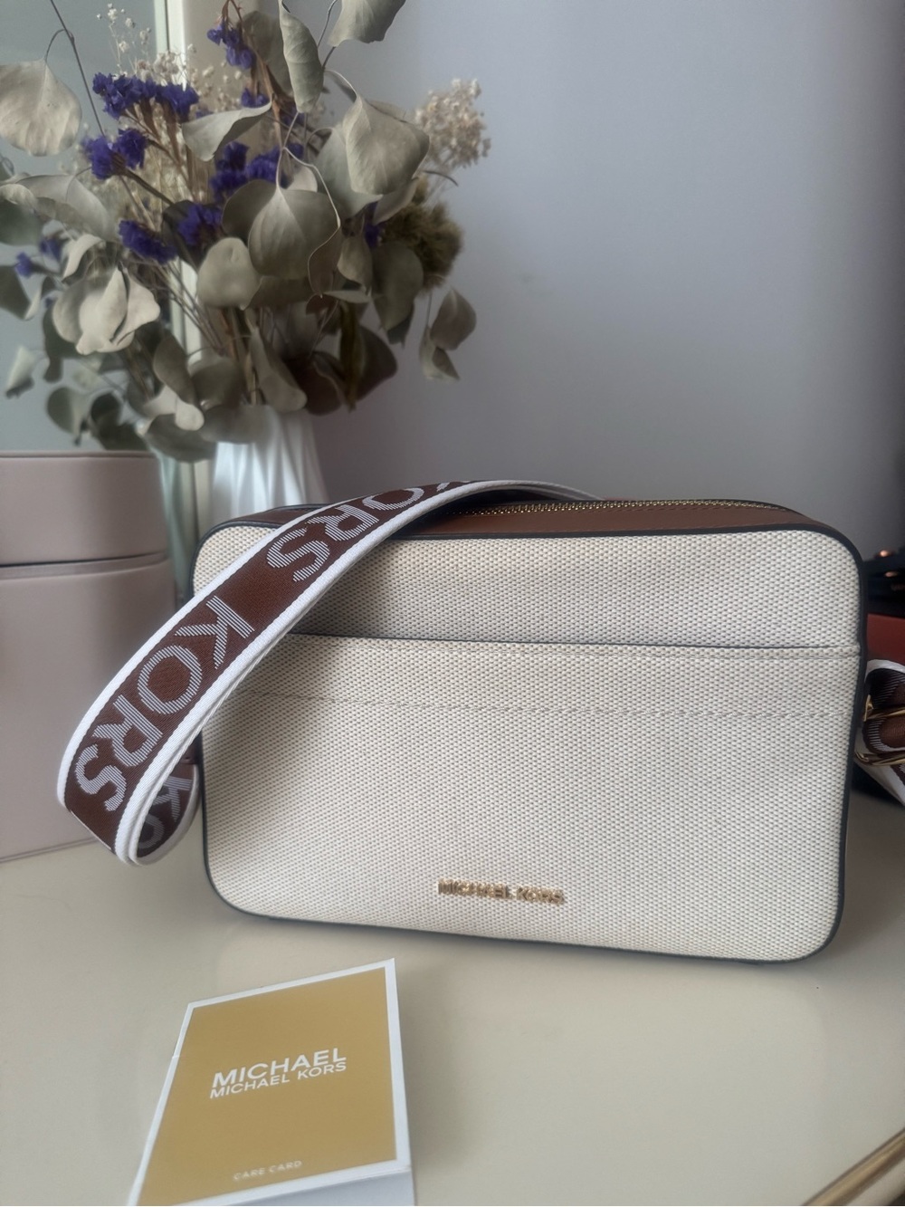 Michael Kors Cream Canvas Messenger Bag with Brown Logo Strap